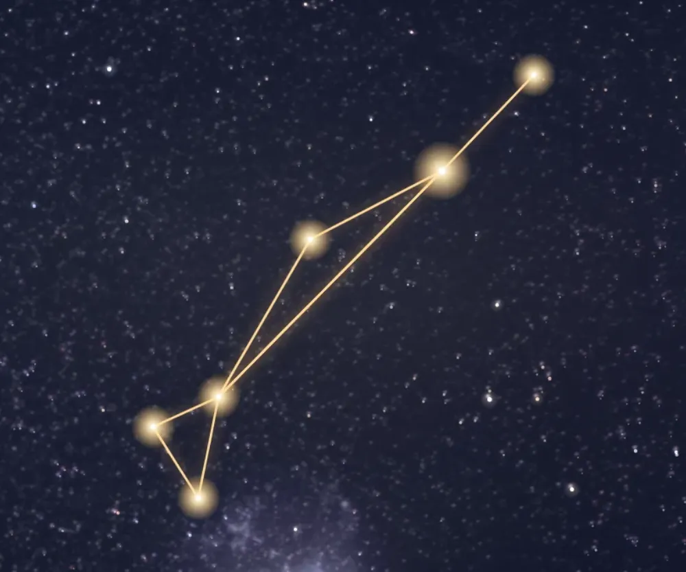 La constellation de la Dorade tracée en or sur le ciel étoilé