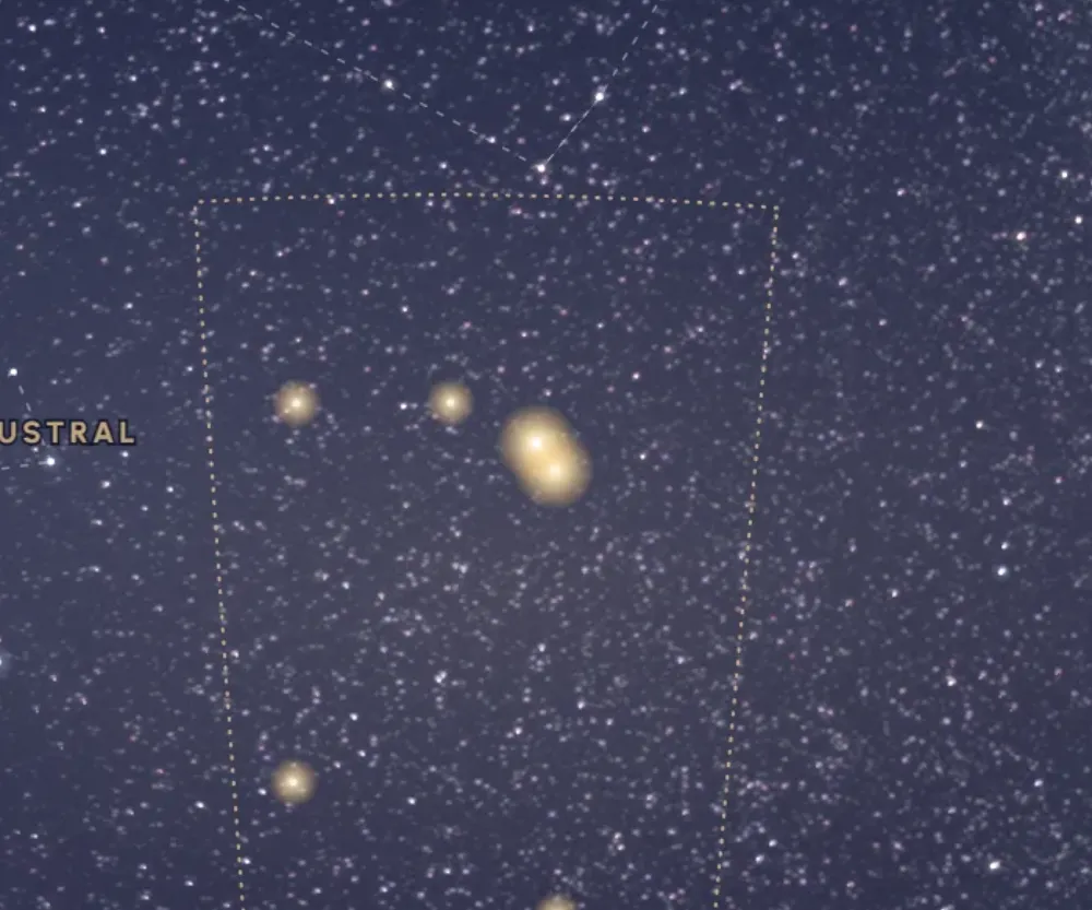 La constellation du Microscope tracée en or sur le ciel étoilé